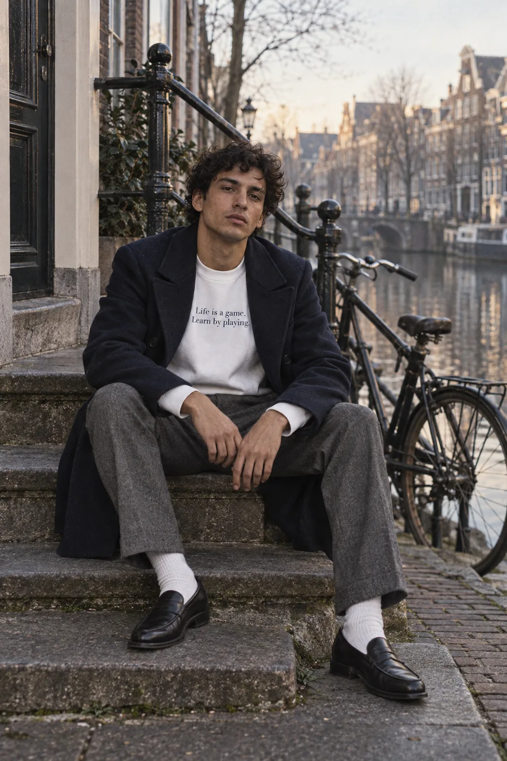 On the steps of an Amsterdam canal house